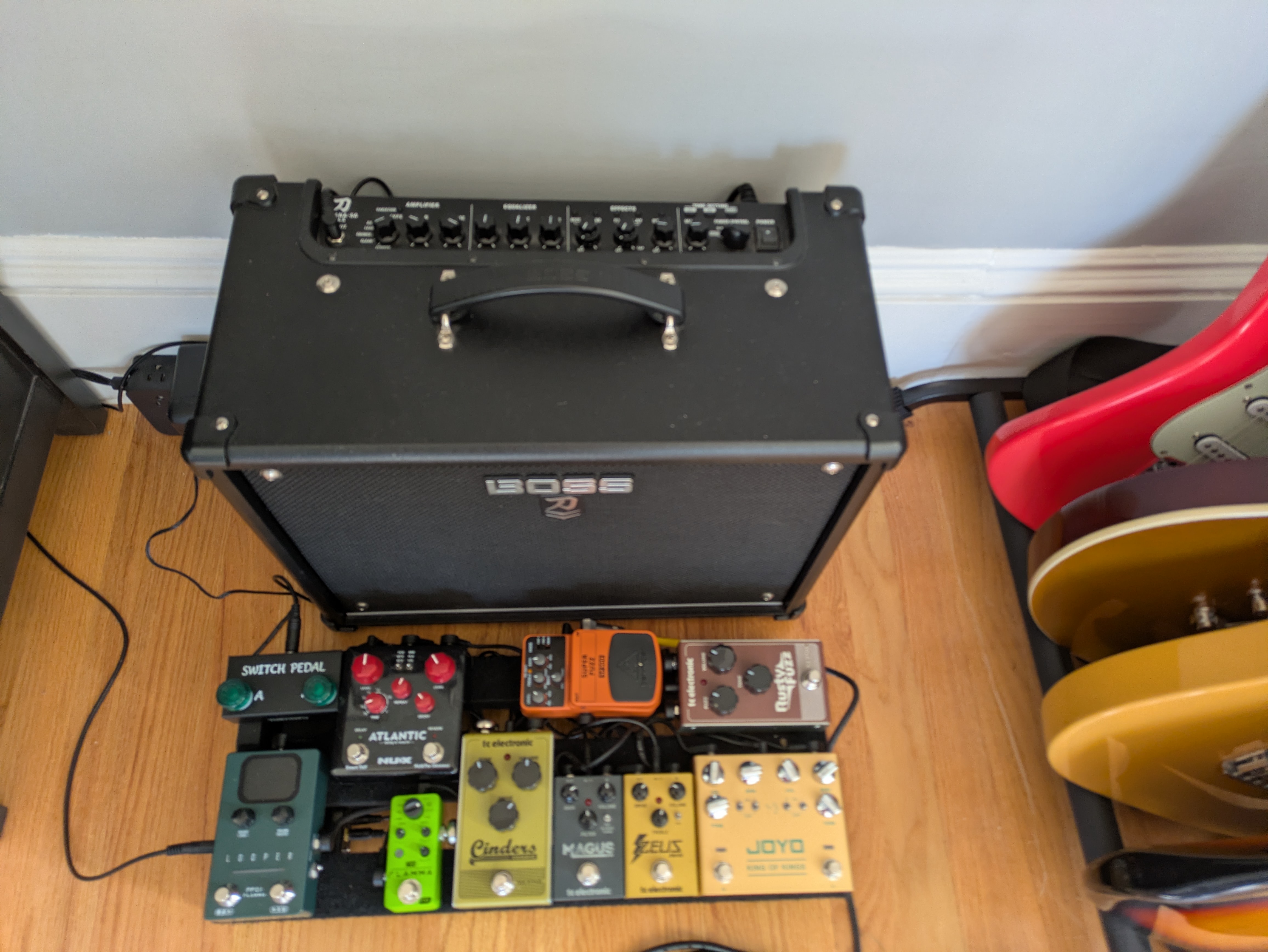 My amp on the floor, with my pedalboard in front of it