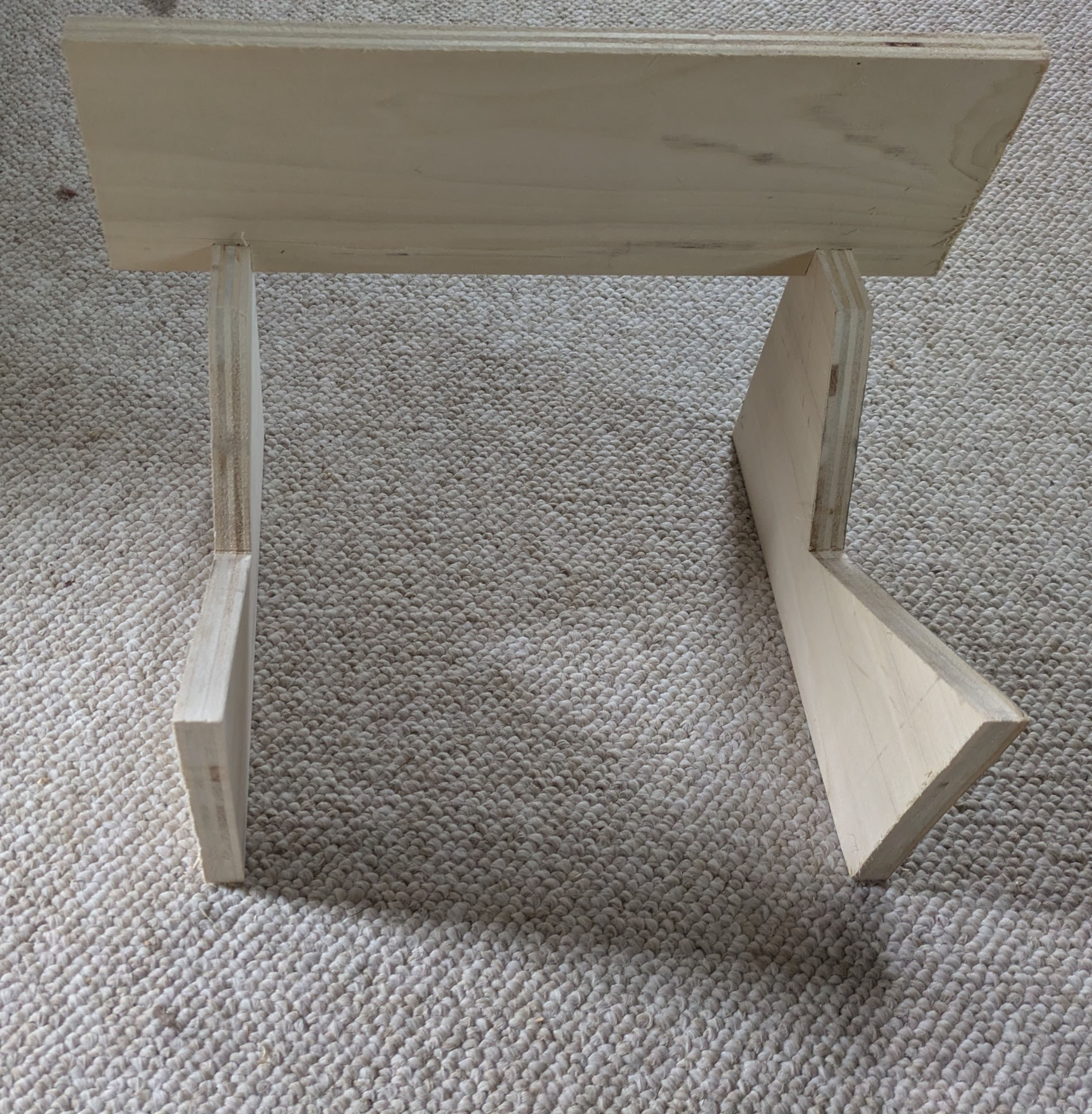 The pieces of the stand without the amp on top of it